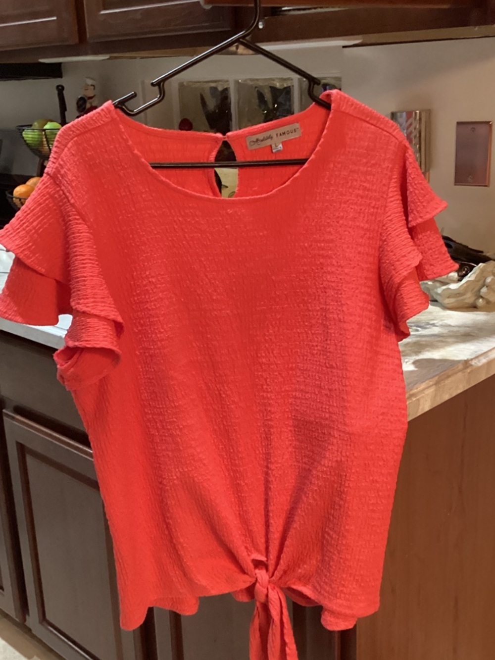 Absolutely Famous Coral Tie-Front Ruffle Sleeve Top